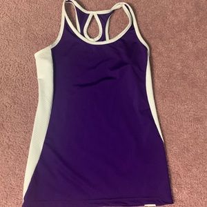 i’m selling a purple tank top with a cool design.